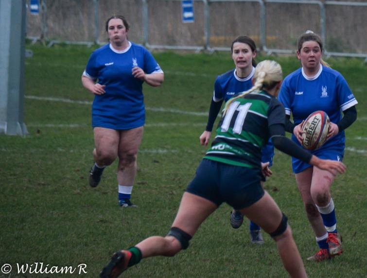 Elin Williams runs the ball out of defence run the ball out of defence